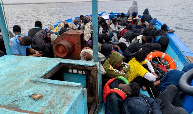 Migranti na brodu, ilustracija